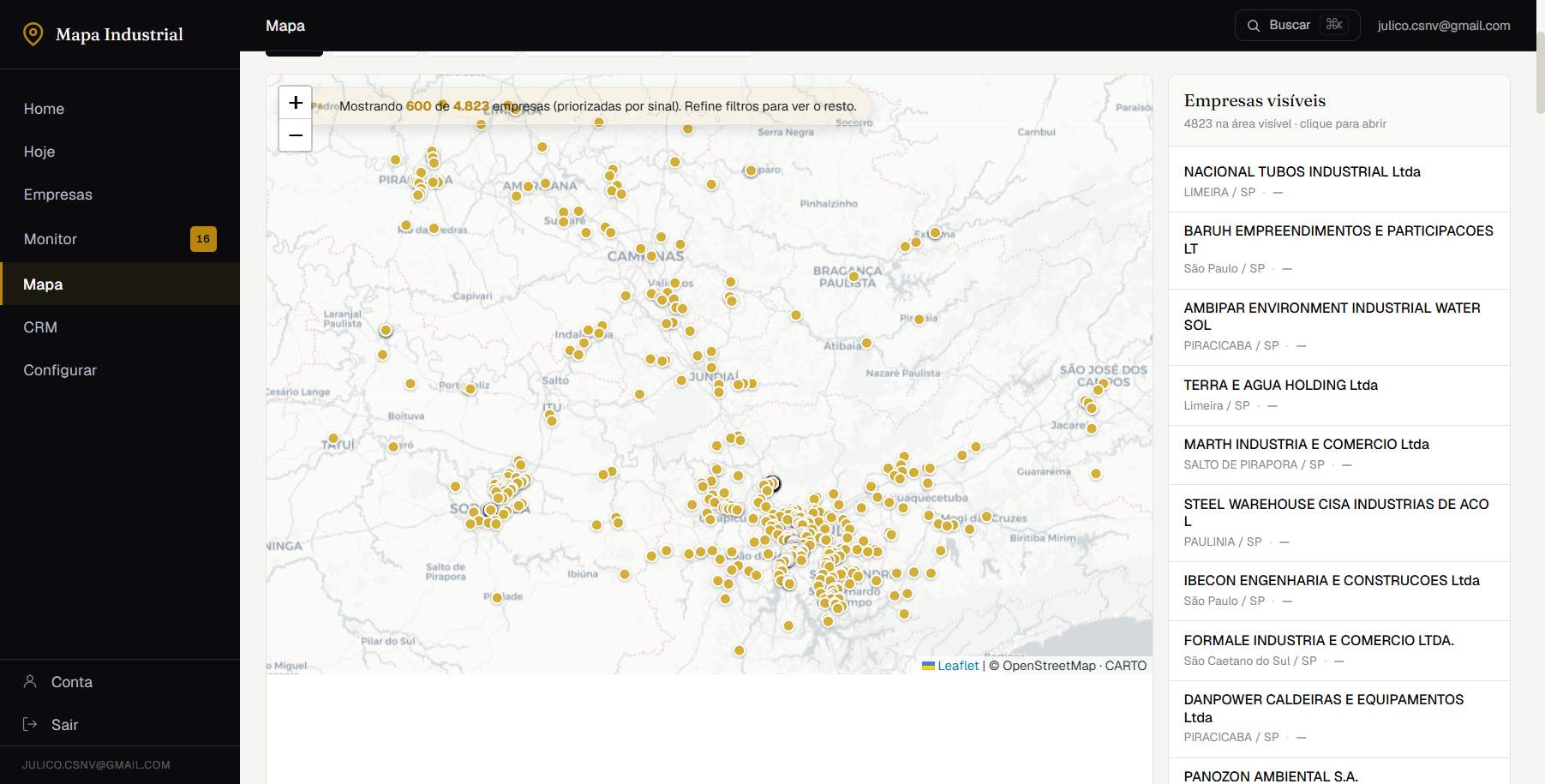 Mapa do portal com 4.823 indústrias reais em São Paulo, pins dourados e lista de empresas com sinais públicos